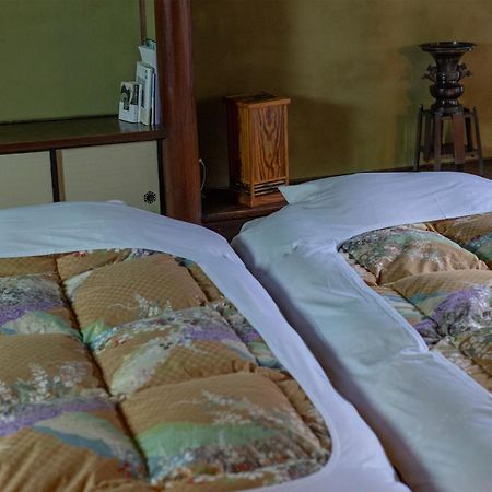 Itsumoya Hotel Hatsukaichi Buitenkant foto